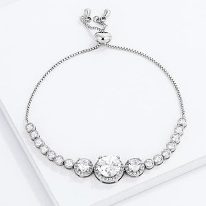 Adjustable Rhodium Plated Graduated Clear CZ Bolo Style Tennis Bracelet - Jewelry Xoxo