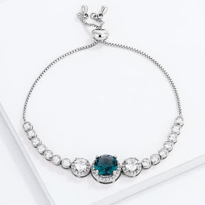 Adjustable Rhodium Plated Graduated CZ Bolo Style Tennis Bracelet - Jewelry Xoxo