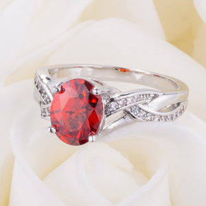 Classic 2ct Apple Red CZ Rhodium Plated Oval Ring - Jewelry Xoxo